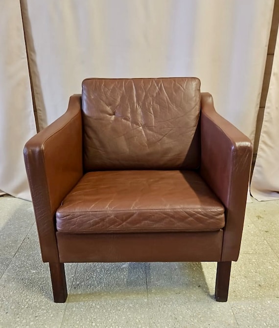 Danish vintage brown leather low back armchair 1960s