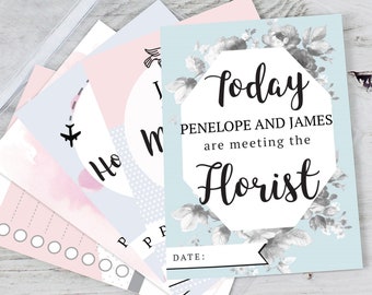 May include: A set of light blue and pink cards with floral designs. The cards have a white octagon with the text "Today Penelope and James are meeting the Florist" and a blank space for a date.