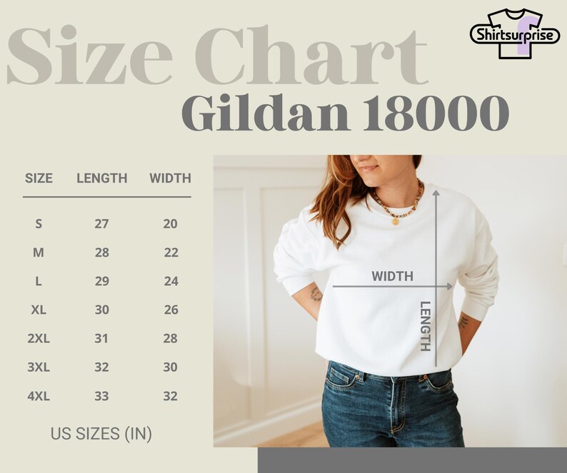 K&ouml;nnte beinhalten: Gr&ouml;&szlig;entabelle f&uuml;r Gildan 18000 Sweatshirts, mit Ma&szlig;en in Zoll. Die Tabelle enth&auml;lt die Gr&ouml;&szlig;en S bis 4XL, mit entsprechenden L&auml;ngen und Breiten. Eine Person tr&auml;gt ein wei&szlig;es Sweatshirt und blaue Jeans.