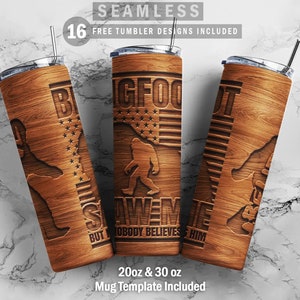 May include: Three brown wood-grain tumblers with a Bigfoot design. The tumblers have the text "Bigfoot" and "Saw him but nobody believes him".