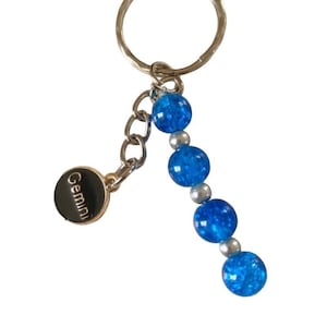 Llaveros signos del zodiaco, llaveros personalizados, llavero pingüino, llavero luna, llaveros, signos del zodiaco, llaveros del zodiaco,