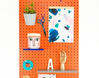 Large metal pegboard in Coral, display peg board, wall display