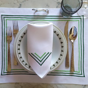Trittico, series in pure white linen with embroidery in 3 shades of green. Tablecloth, Runner, Placemat, Centerpiece, Napkin