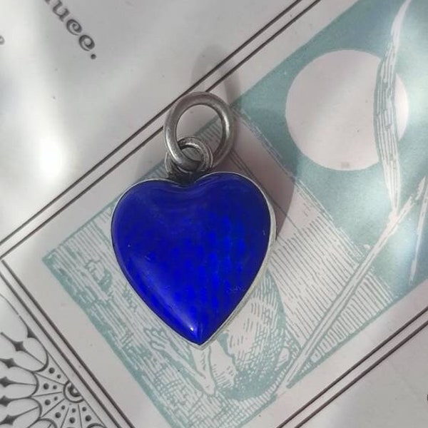 Beautiful silver heart shaped pendant with the most perfect deep blue guilloche enamel.