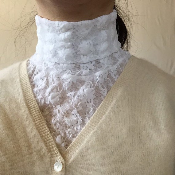 white lace turtleneck dress