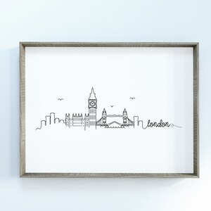 May include: A black and white line drawing of the London skyline, featuring Big Ben, the Houses of Parliament, and Tower Bridge. The word "london" is written in cursive below the skyline.