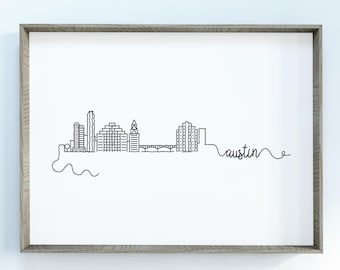 May include: A black and white line drawing of the Austin, Texas skyline with the word "austin" written in cursive below the skyline.