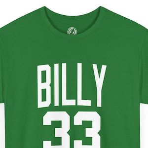 May include: Green t-shirt with white text that reads "BILLY 33"