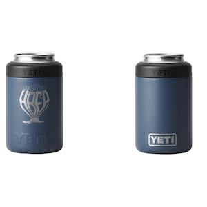 May include: Two navy blue YETI can coolers. One cooler features the text "ABEF" in a stylized design, and the other has the YETI logo. Both have a black top and silver rim.