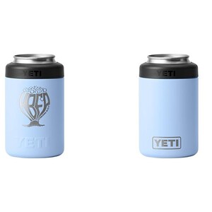 May include: Two light blue YETI can coolers. One has a silver graphic with the letters "BFD" and a tree design. The other has the YETI logo. Both have a black top and silver rim.