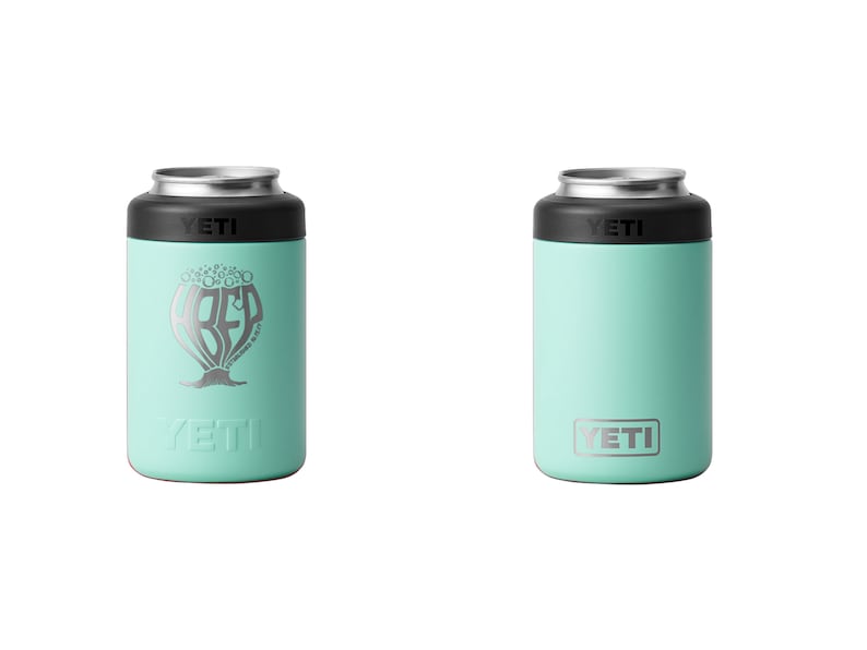 May include: Two mint-colored YETI can insulators. One features the text "BFD" in a stylized design with the YETI logo below. The other has the YETI logo. Both have a black top and silver rim.