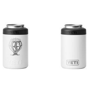 May include: Two white YETI can insulators. One features a silver graphic of a beer design with the word "BEER" and the text "Brewed Right". The other has the YETI logo. Both have a black top and silver rim.