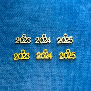 2026 Charms, 2025 Charms (Gold or Silver) 2024 Charms, 2023 Charms
