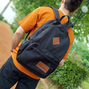 Sac à dos en toile personnalisé - Sac d'école ou de sport avec nom personnalisé pour adolescents et adultes - Gris ou noir