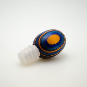 wine stopper, wood bottle stopper. Hand turned of colorful laminated wood.