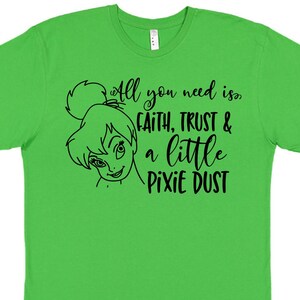 May include: Green t-shirt with a black graphic of Tinkerbell and the text "All you need is FAITH, TRUST & a little PIXIE DUST".