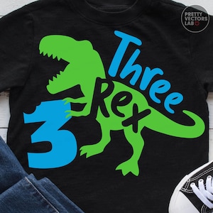 May include: A white ceramic mug with a black handle and the text "But First, Coffee" in a handwritten style. The mug is on a white surface. The mug is approximately 4 inches tall.