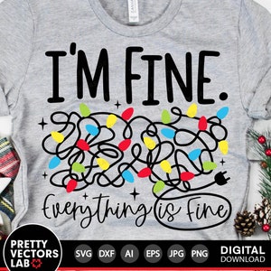May include: A gray t-shirt with the text "I'M FINE. Everything is fine" in black. The text is surrounded by a tangled string of Christmas lights with red, yellow, blue, and green bulbs.