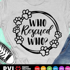 May include: A gray t-shirt with a black graphic design of a paw print wreath with the text "WHO Rescued WHO?" printed on it.