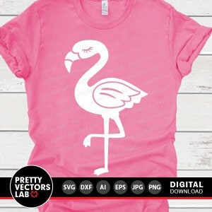 May include: A white flamingo silhouette on a pink t-shirt. The flamingo is standing on one leg with its head tilted to the side. The t-shirt is a popular choice for summer fashion.