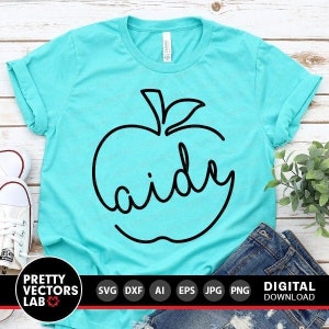 May include: A turquoise t-shirt with a black outline of an apple with the word "aidy" written inside the apple.