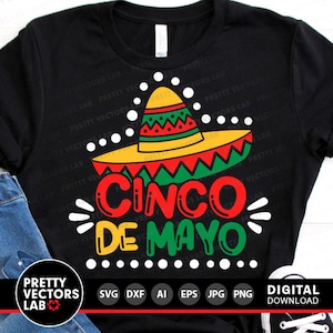 K&ouml;nnte beinhalten: Schwarzes T-Shirt mit einem farbenfrohen Cinco de Mayo-Design. Das Design zeigt einen Sombrero, die Worte "Cinco de Mayo" in Rot und Gr&uuml;n und dekorative Elemente. Das Shirt ist ein digitaler Download.