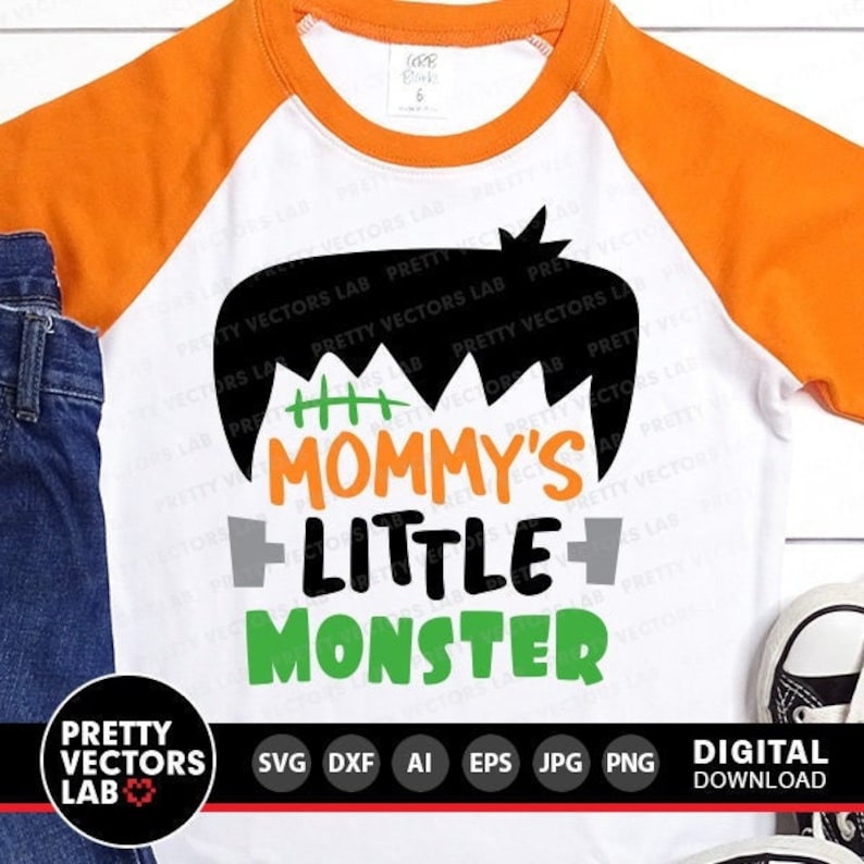 May include: A white t-shirt with an orange raglan sleeve design. The shirt features a black and green Frankenstein-style monster graphic with the text "Mommy's Little Monster".