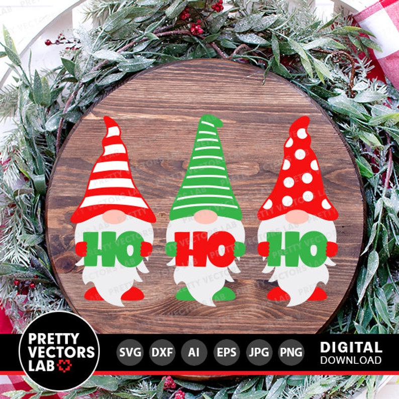 May include: Three gnomes holding signs that say "Ho Ho Ho" in green letters. The gnomes are wearing red and white striped hats, green and white striped hats, and red hats with white polka dots. The gnomes are on a wooden background.