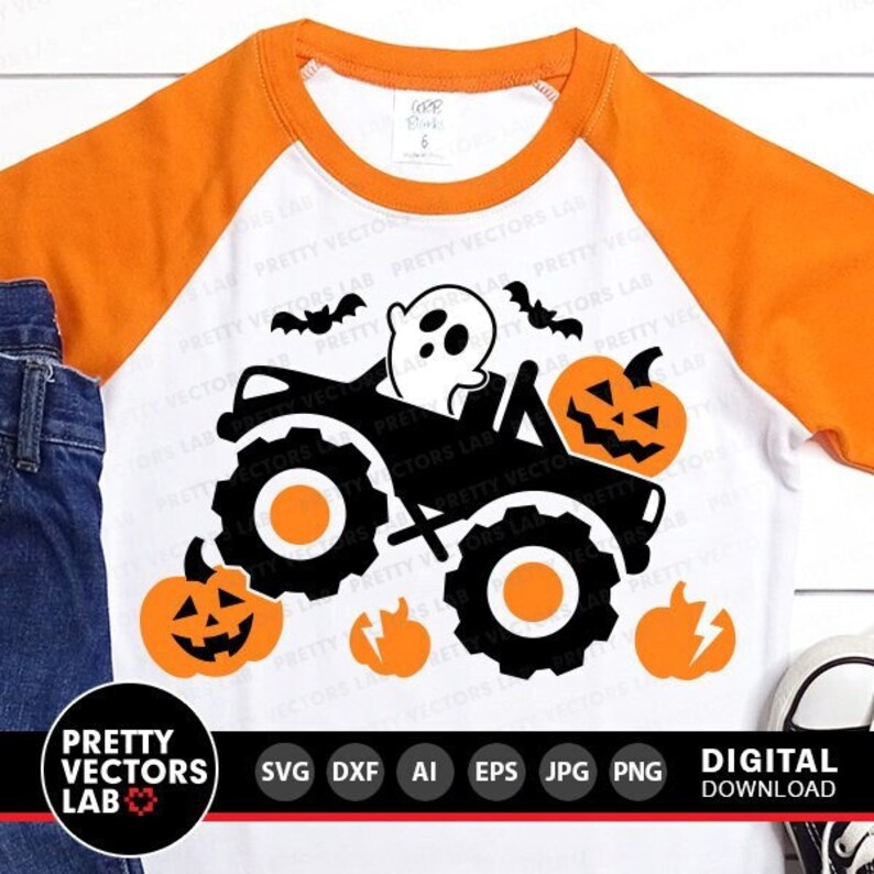 May include: A white t-shirt with an orange and black monster truck design. The truck has a ghost in the passenger seat and a jack-o-lantern in the back. There are smaller jack-o-lanterns scattered around the truck. The text "Pretty Vectors Lab" is at the bottom of the image.