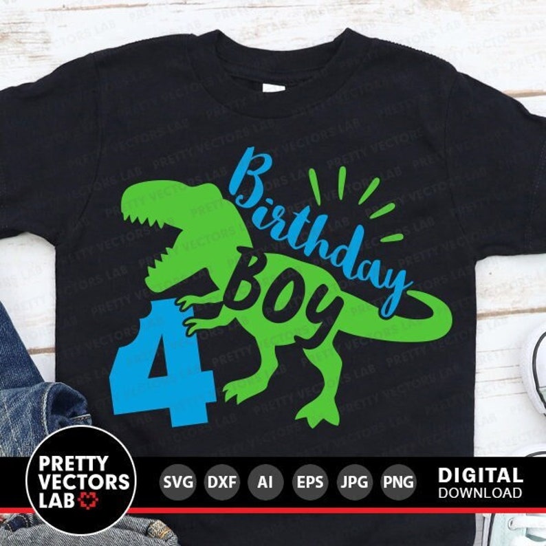 May include: A black t-shirt with a green dinosaur graphic and the text "4th Birthday Boy". The dinosaur is holding a blue number 4.