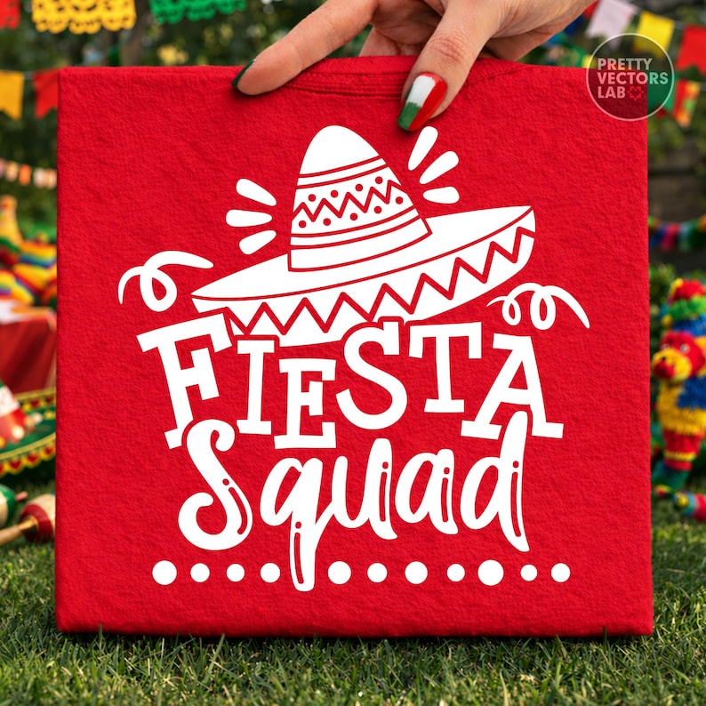 May include: A red square canvas with the words "Fiesta Squad" in white, along with a sombrero graphic. The canvas is held by a hand with painted nails. The background includes festive decorations.