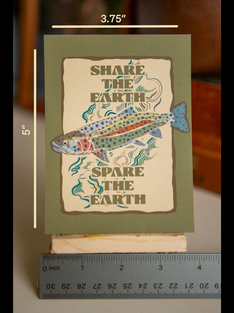 May include: A green card with a brown background featuring a colorful trout fish and the text "SHARE THE EARTH" and "SPARE THE EARTH". The card measures 3.75 inches by 5 inches.