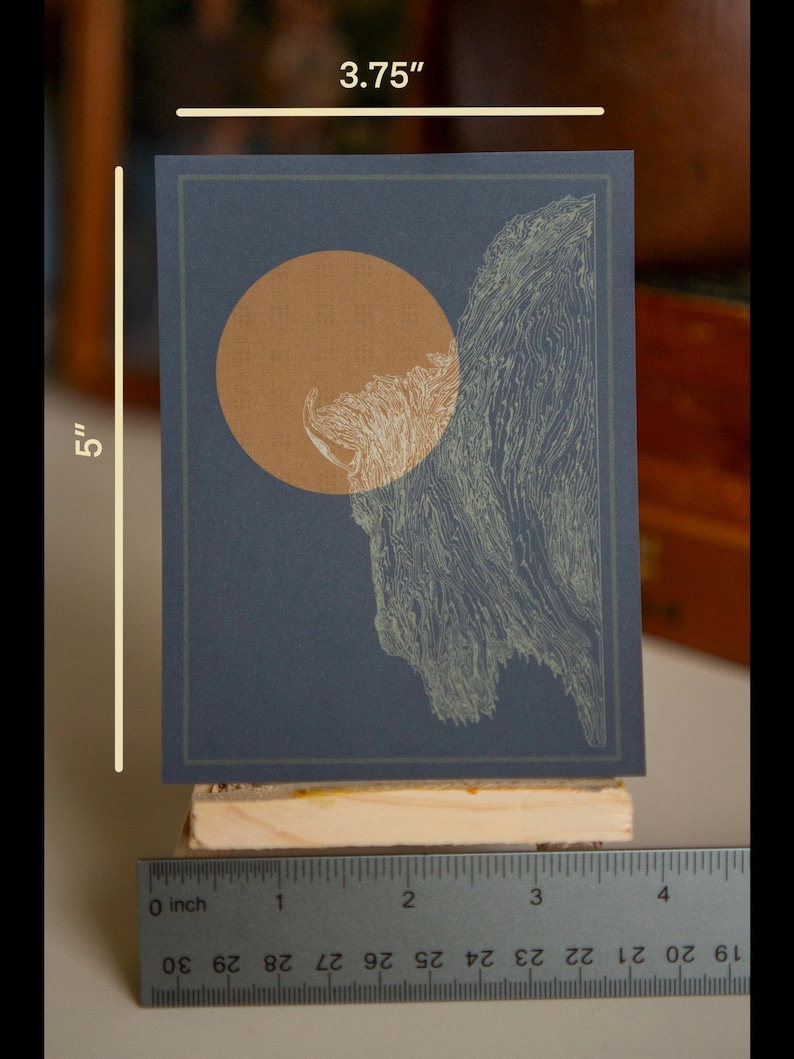 May include: A 5 inch by 3.75 inch print of a minimalist abstract design featuring a large, orange circle and a green, organic shape on a dark blue background.