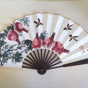 Leque dobrável chinês tradicional pintado à mão - Romã, simbolizando felicidade.