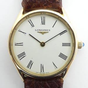 LONGINES 9 kt goud 17 juwelen, handmatig opwindbaar herenpolshorloge in G.W.O.