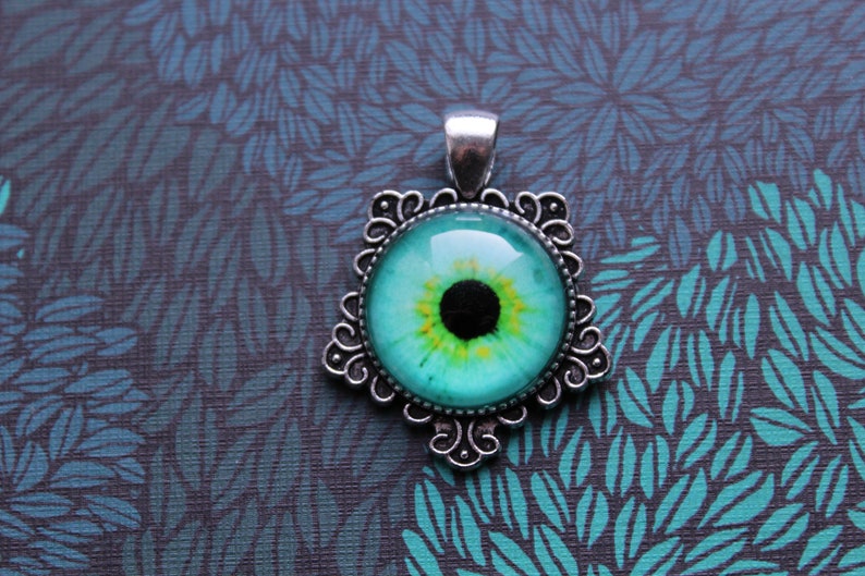 1 chain trailer dragon eye cat eye turquoise round pupil silver colors playful sweet charm gift