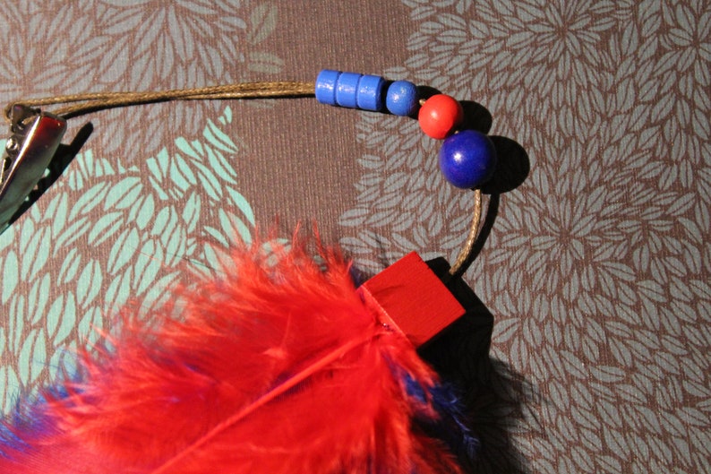 Hair clip fascinator red blue feather glitter cute magic Indian wizard enchants playful charm gift