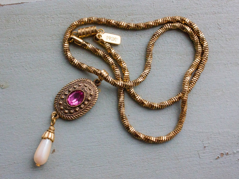 Details about Vintage 1928 Gold Tone Chain Pink Acrylic Chandelier Beaded Pendant Necklace Details about Vintage 1928 Gold Tone Chain Pink Acrylic Chandelier Beaded Pendant Necklace