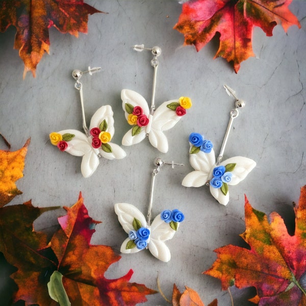 Boucles d'oreilles Papillons fleurs en fimo et acier inoxydable