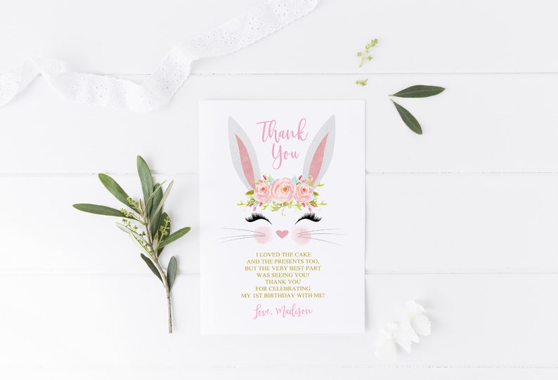 May include: Thank you card with a bunny rabbit illustration wearing a pink flower crown. The text reads "Thank You I loved the cake and the presents too, but the very best part was seeing you! Thank you for celebrating my 1st birthday with me. Love, Madison."