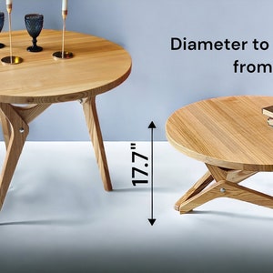 May include: Two round wooden tables with a unique X-shaped base. The larger table measures 29.5 inches in diameter and the smaller table measures 17.7 inches in diameter.  "Diameter to choose from" is written in black text above the smaller table.