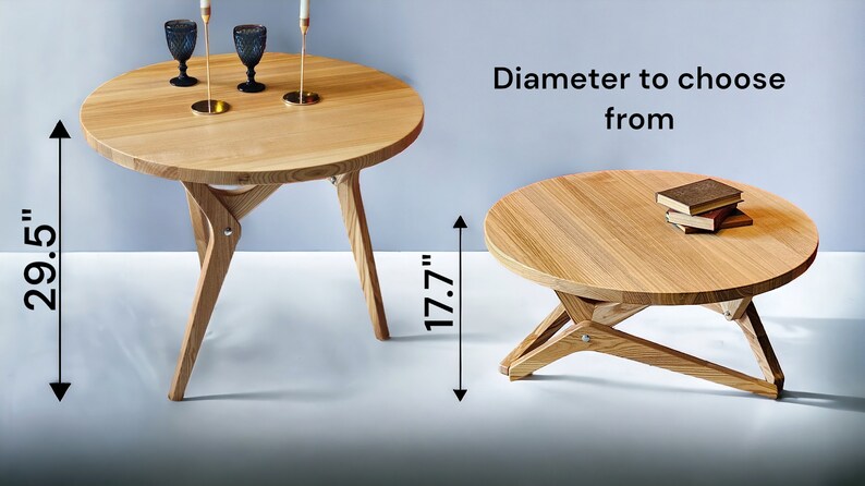 May include: Two round wooden tables with a unique X-shaped base. The larger table measures 29.5 inches in diameter and the smaller table measures 17.7 inches in diameter.  "Diameter to choose from" is written in black text above the smaller table.