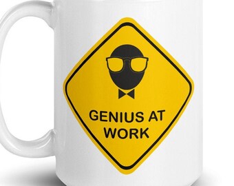 Genius bei der Arbeit Becher