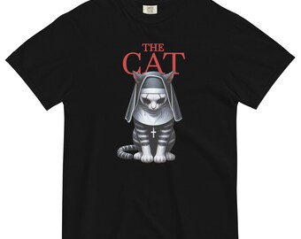 May include: Black t-shirt with a graphic of a cat dressed as a nun. The text "THE CAT" is printed in red above the cat.