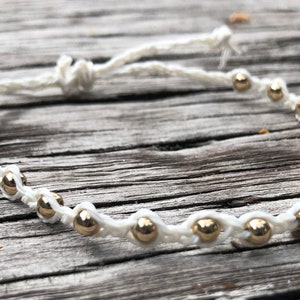 Pulseira de contas de ouro branco