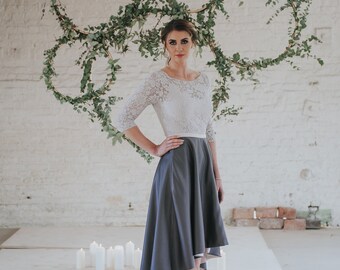 skirt and top outfit for wedding guest