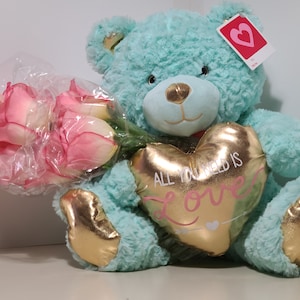 12 inch plush Teddy Bear doll with flowers, made by Animal Adventure, good condition