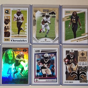 Alvin Kamara 6 Football Card Lot Panini Chronicles, Playoff, Donruss, Illusions