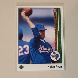 1989 Upper Deck Nolan Ryan with Football in hand Baseball Card