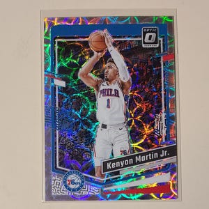 Kenyon Martin Jr. 2023/24 Donruss Optic Prizm Basketball Card serial numbered #ed /249